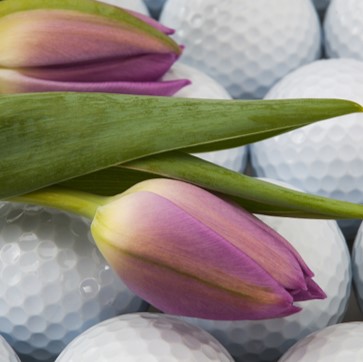 Golf balls and flowers